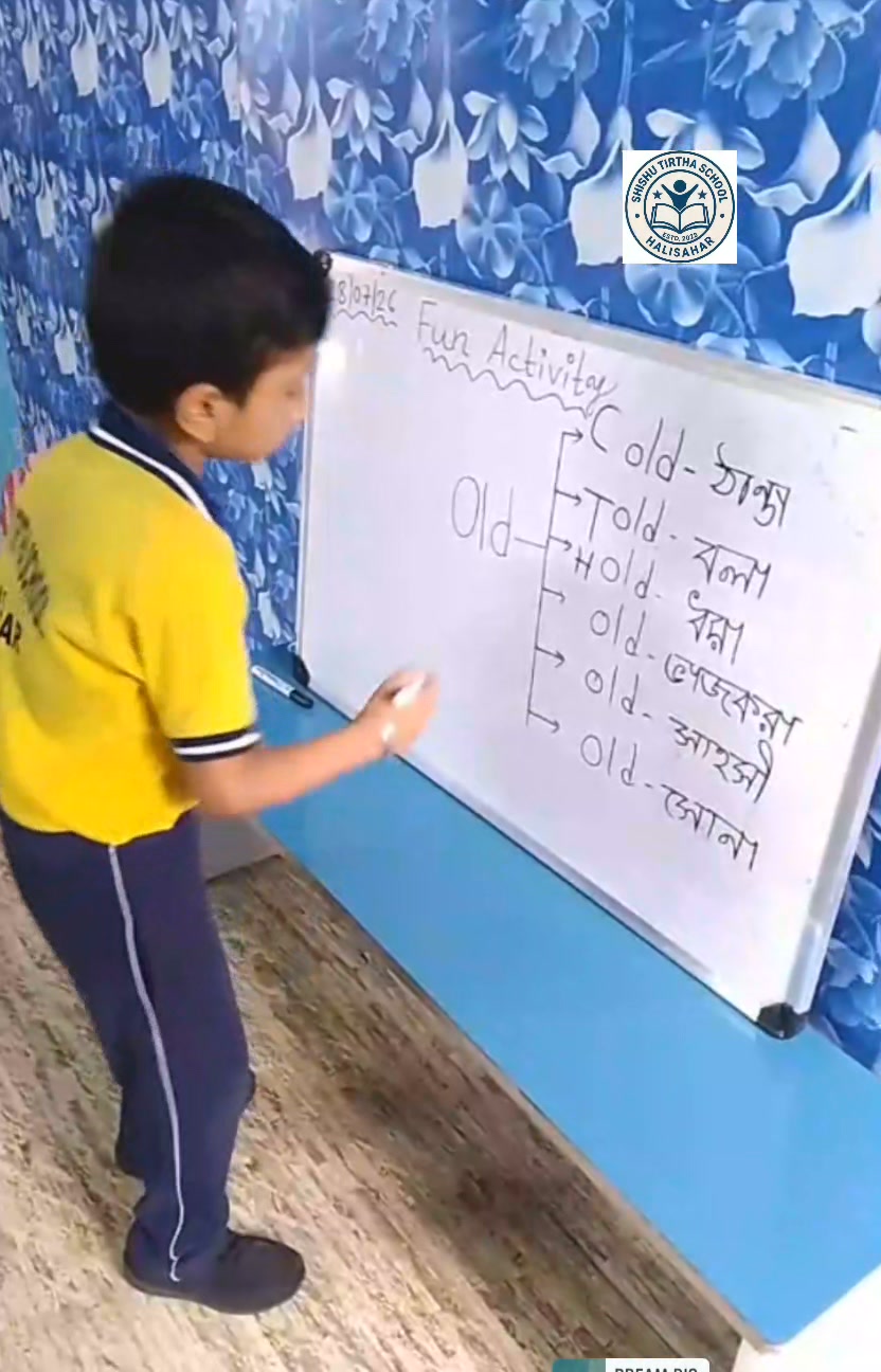 A student writing on the classroom whiteboard