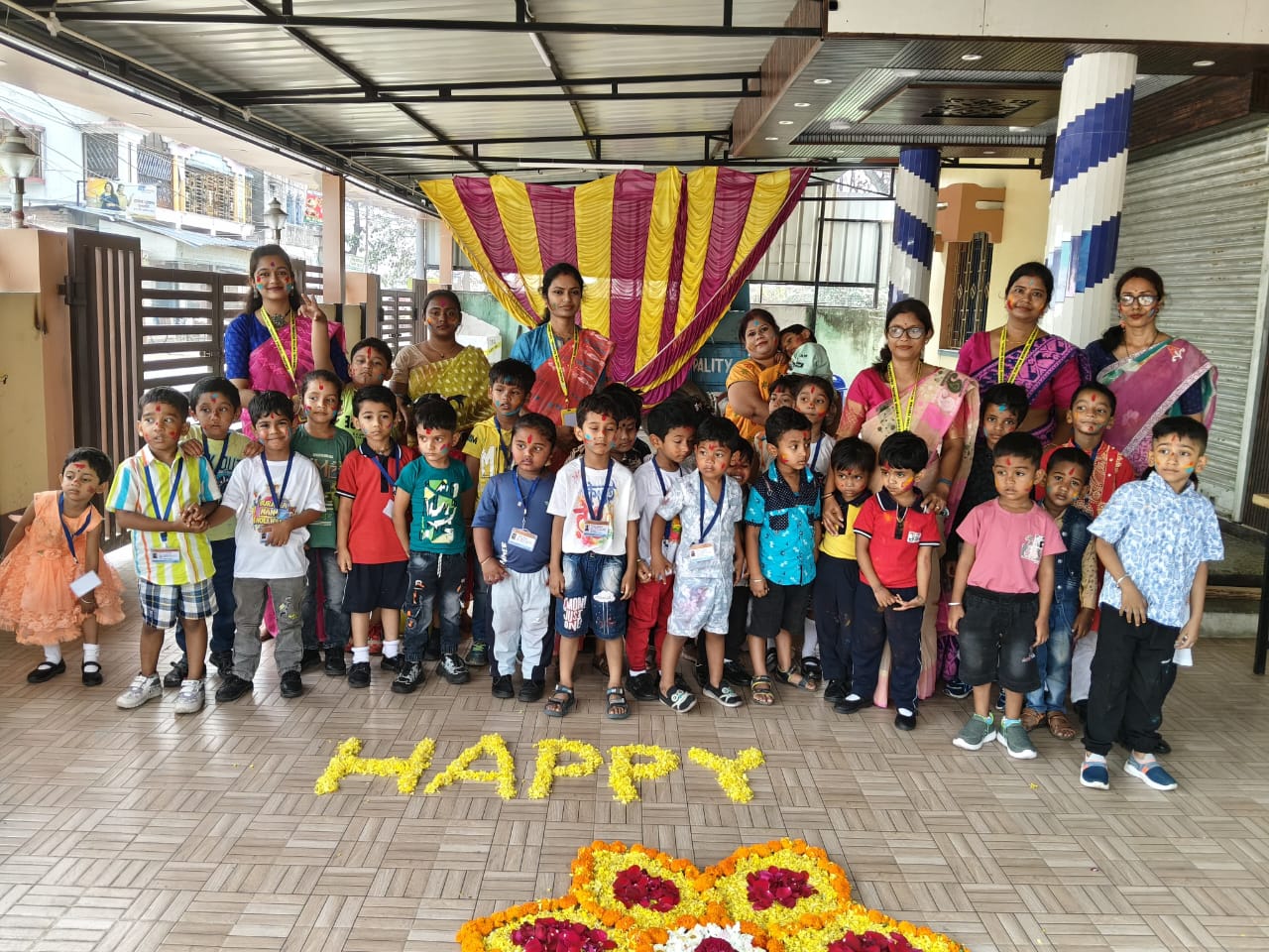Holi celebration pictures with students and teachers