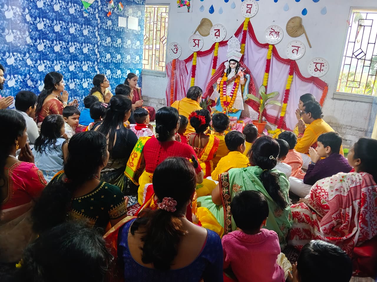 Guardians and students gathered for Saraswati Puja